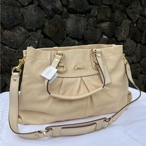 New white leather coach bag